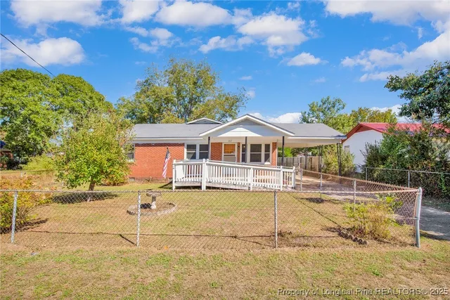 a front view of house with yard