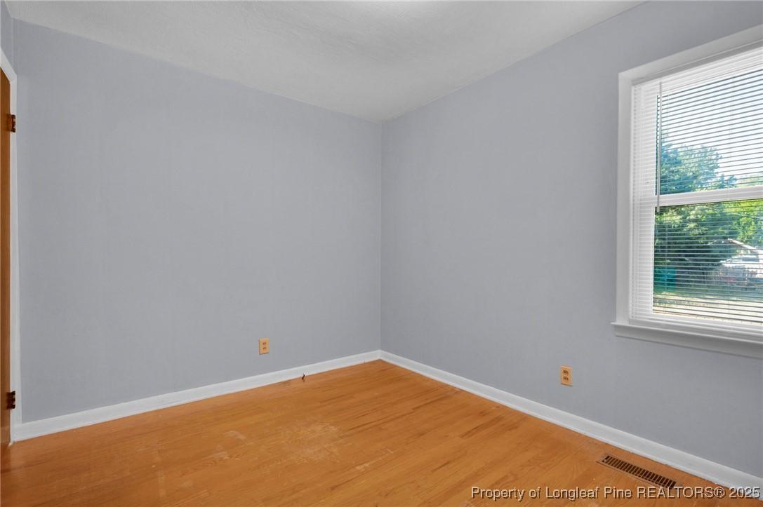 215 South 7th Street Spring Lake, NC 28390 - Photo 29 of 37 an empty room with a window