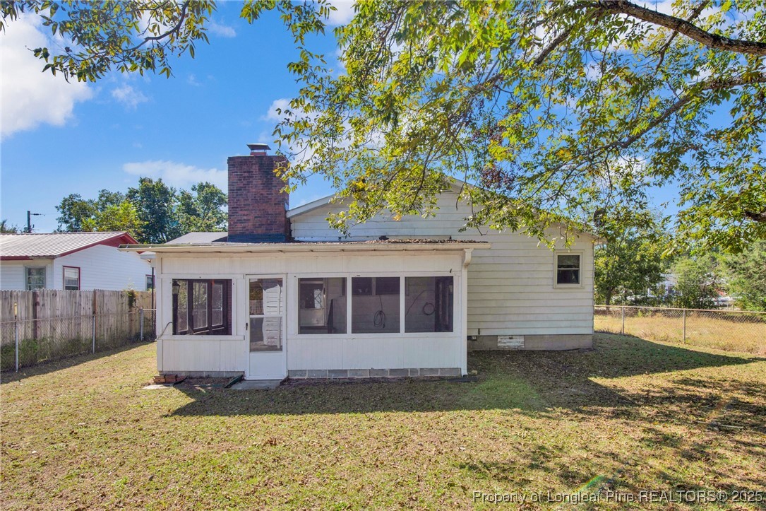 215 South 7th Street Spring Lake, NC 28390 - Photo 32 of 37 a house view with a garden space