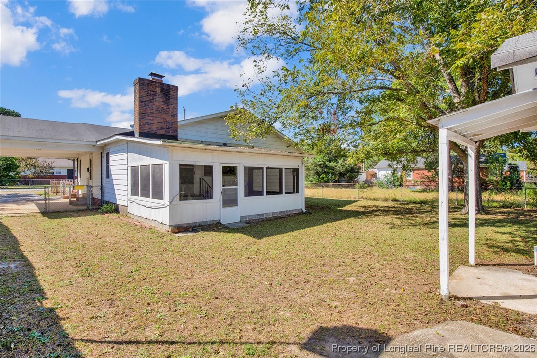 215 South 7th Street Spring Lake, NC 28390 - Photo 33 of 37 a view of a house with a patio
