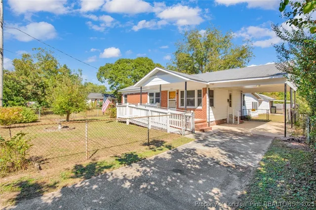 a house view with a garden space