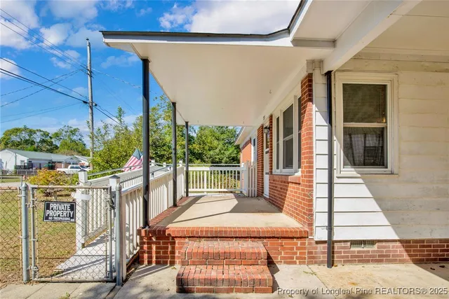 a front view of a house with a porch