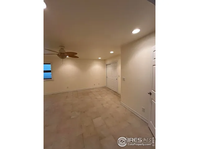 a view of a hallway with closet