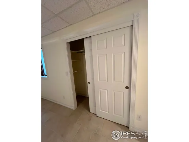 a bathroom with a shower and a toilet