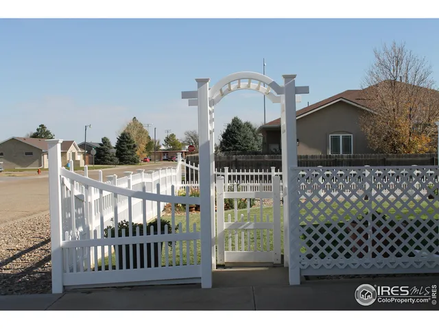 a view of a deck with a fence