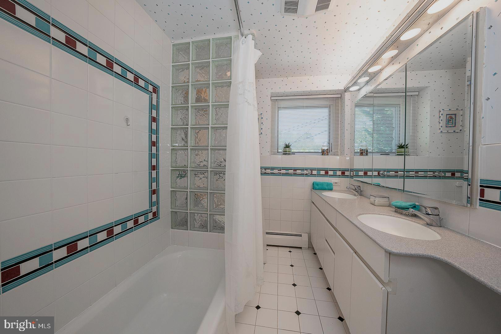 1436 Hillside Road Wynnewood, PA 19096 - Photo 30 of 42 Middle Level Hall Bathroom with double sink