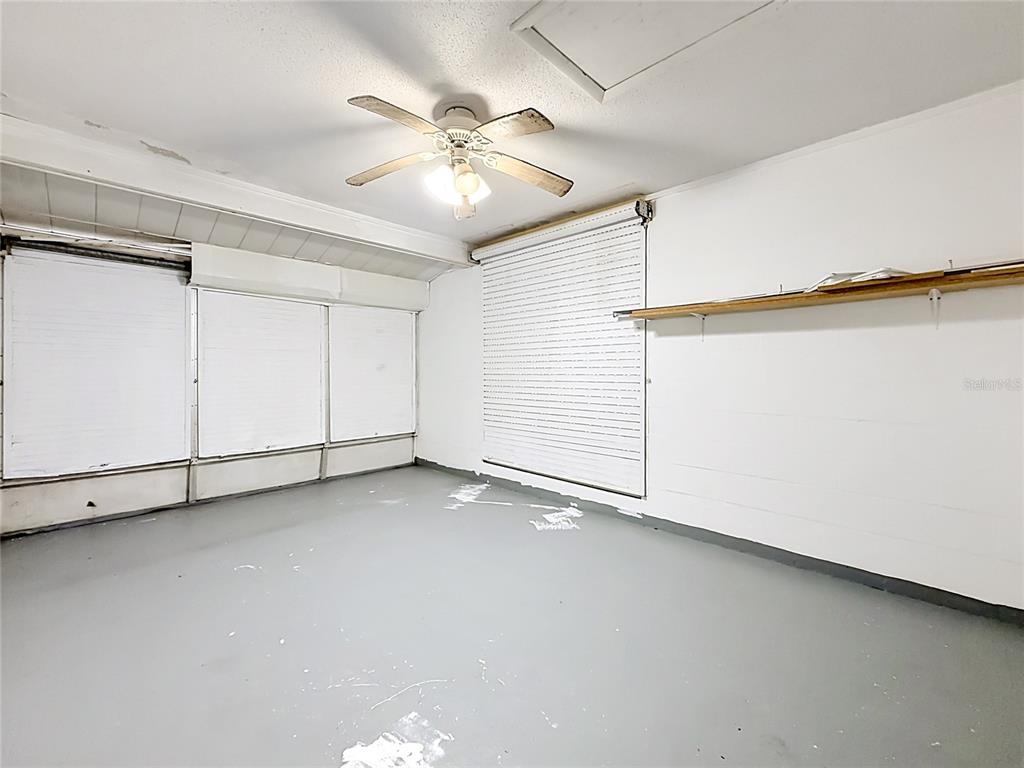 3 Bahia Pl Loop Ocala, FL 34472 - Photo 16 of 31 an empty room with fan