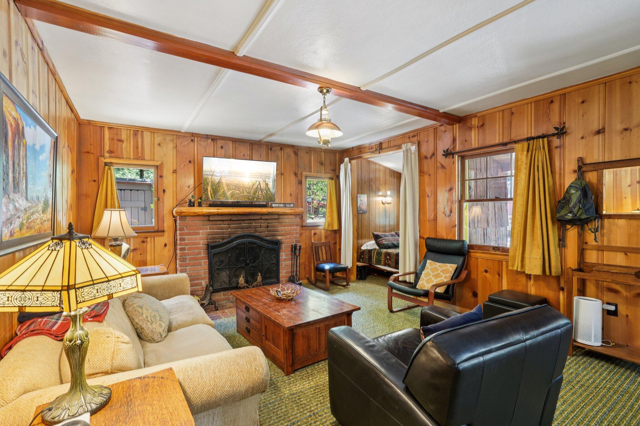 55280 Circle Way Idyllwild, CA 92549 - Photo 5 of 27 a living room with furniture a fireplace and next to a window