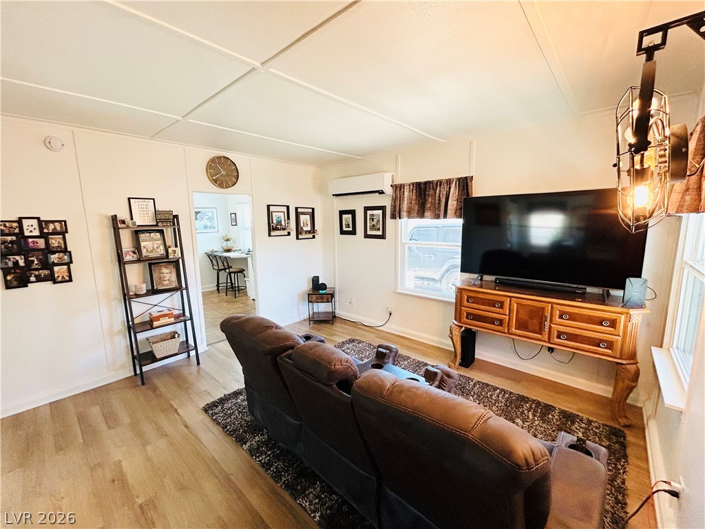 116 West Basic Road Henderson, NV 89015 - Photo 20 of 39 Well-lit living area showcases light wood flooring and clear views to the outdoors.