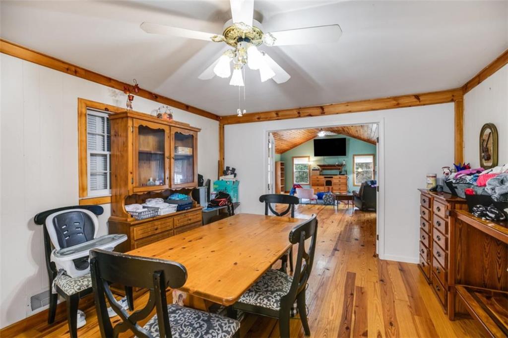 809 Laurel Street Bremen, GA 30110 - Photo 13 of 34 a view of a dining room with furniture and a chandelier
