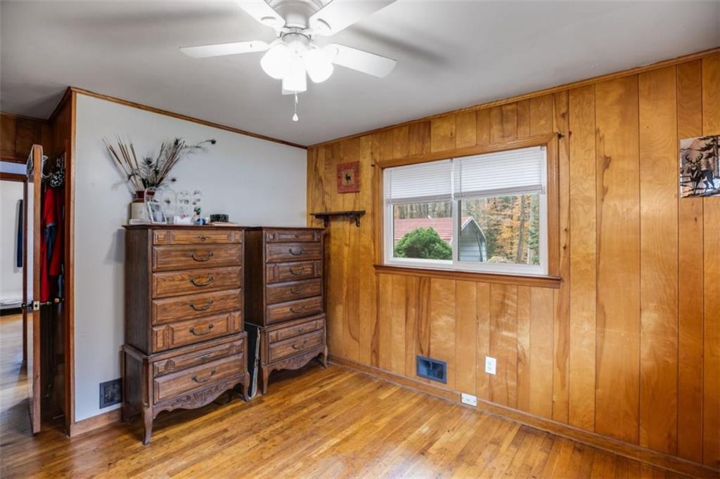 809 Laurel Street Bremen, GA 30110 - Photo 18 of 34 a view of a bedroom with wooden floor and closet