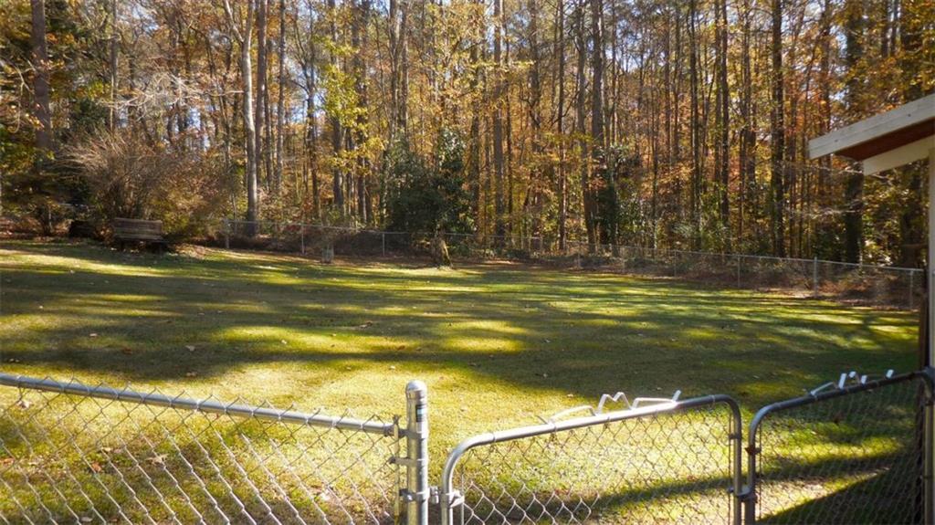 809 Laurel Street Bremen, GA 30110 - Photo 24 of 34 a view of a swimming pool with an outdoor space and seating area