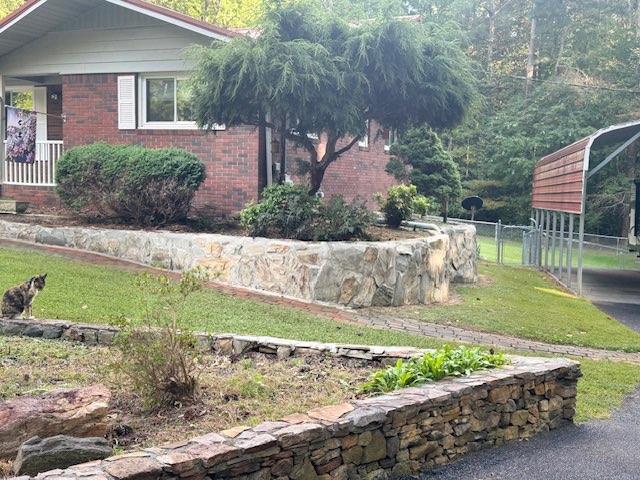 809 Laurel Street Bremen, GA 30110 - Photo 31 of 34 a front view of a house with garden