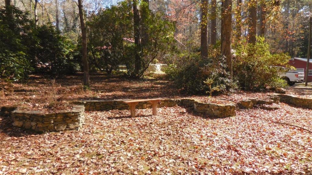 809 Laurel Street Bremen, GA 30110 - Photo 33 of 34 a view of a yard with large trees