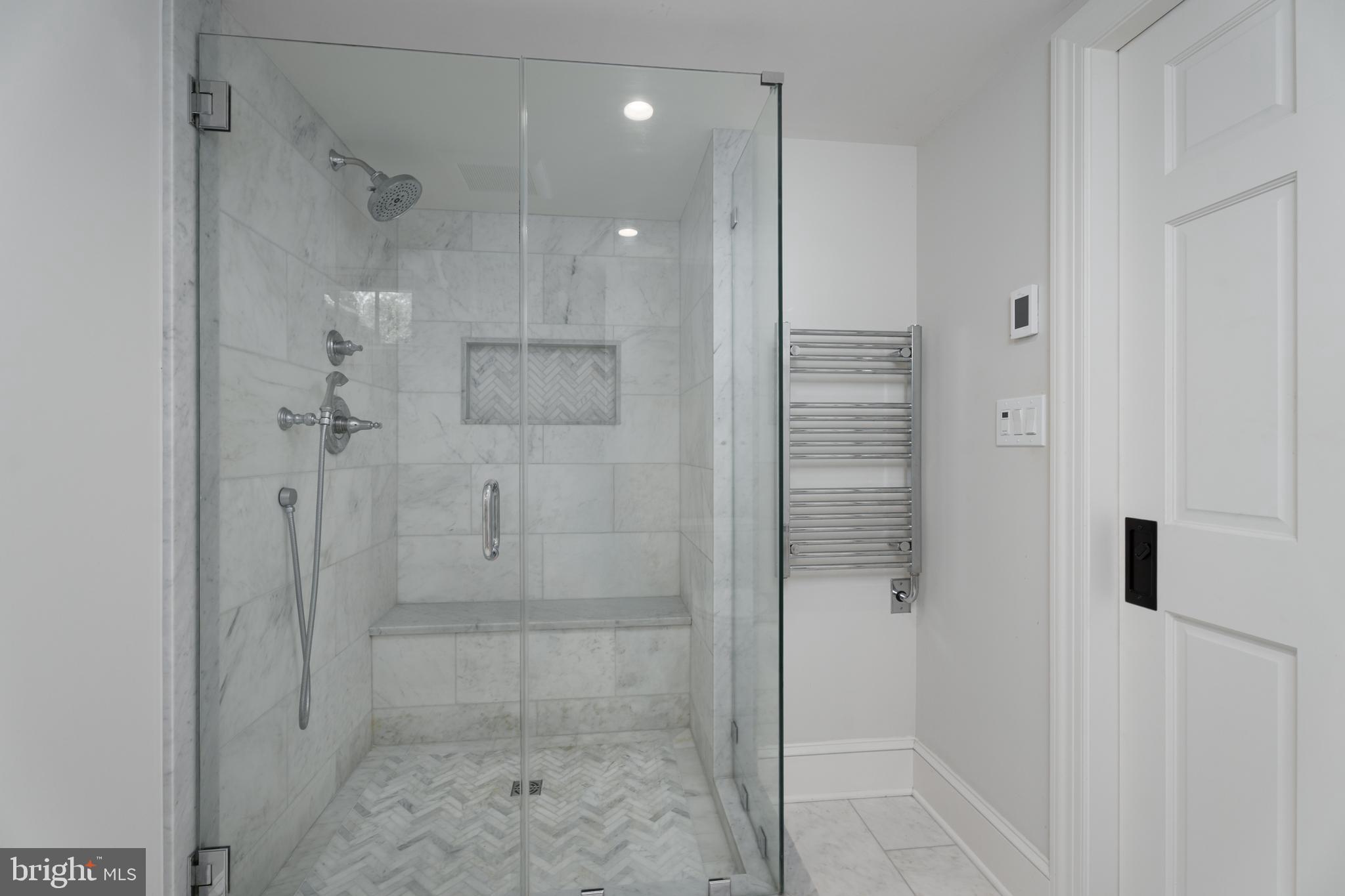 109 Moore Street Princeton, NJ 08540 - Photo 18 of 26 a bathroom with a shower and a glass door