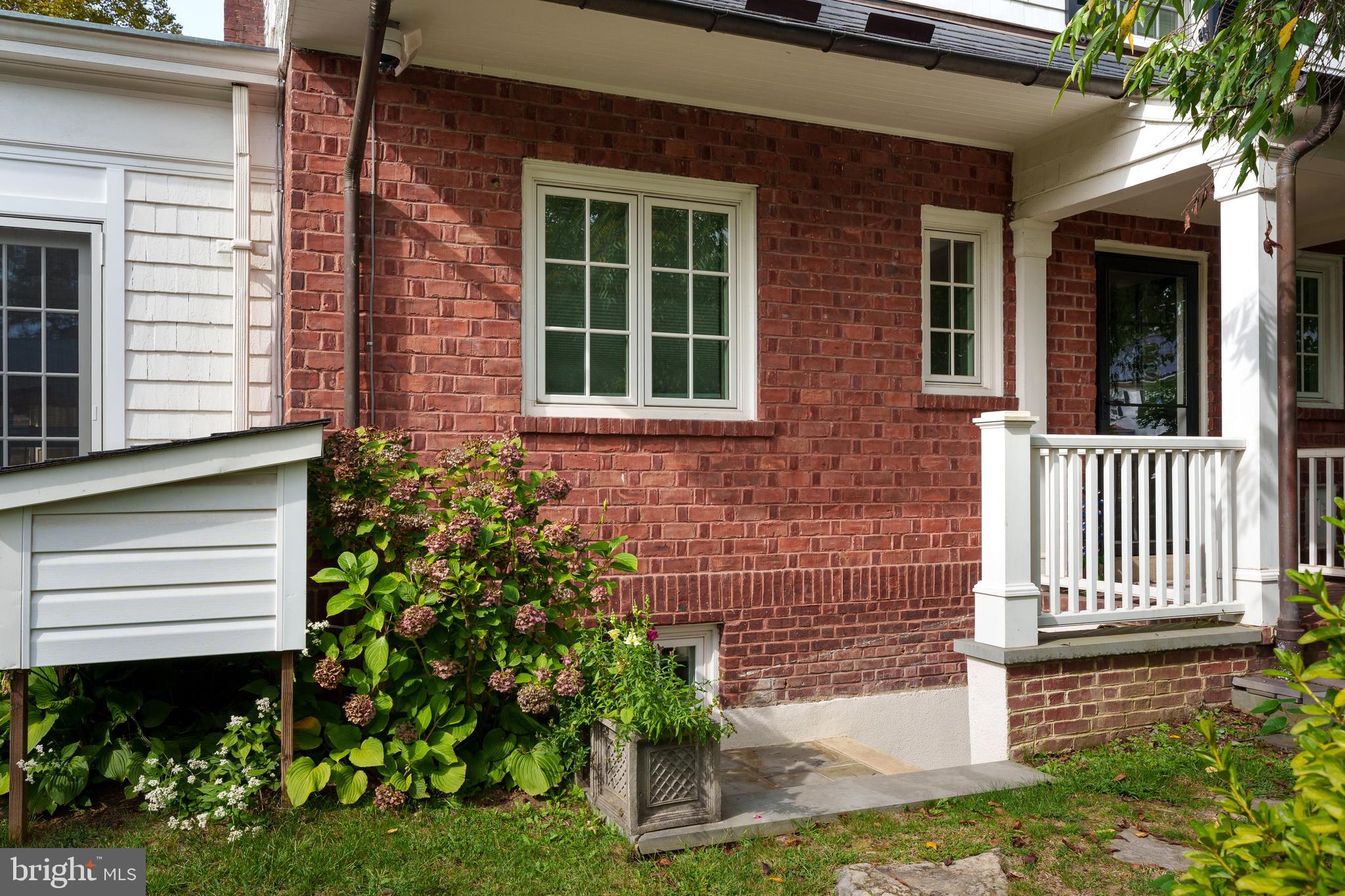 109 Moore Street Princeton, NJ 08540 - Photo 2 of 26 a front view of a house with a yard