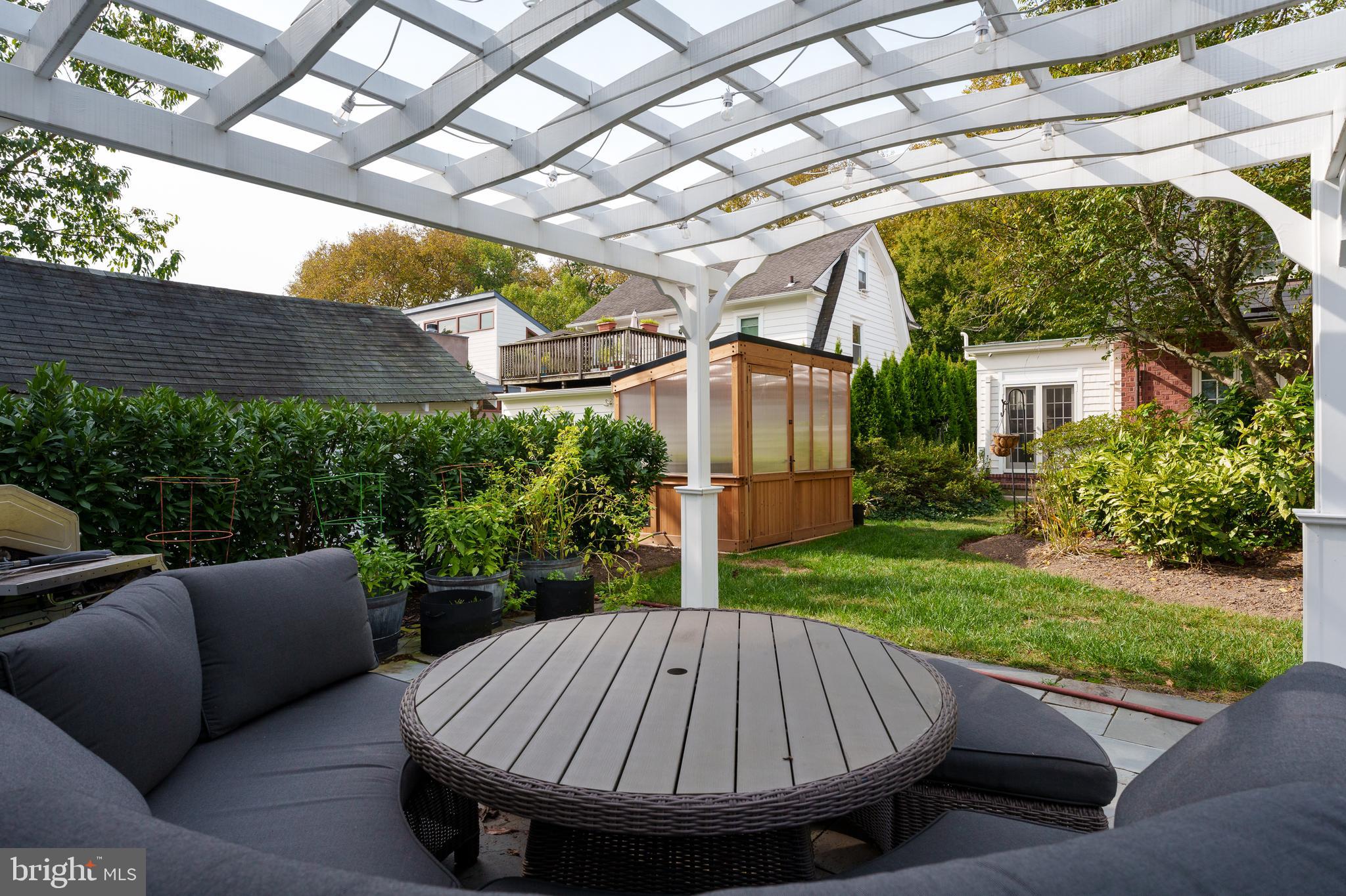 109 Moore Street Princeton, NJ 08540 - Photo 21 of 26 a view of backyard with swimming pool and outdoor seating
