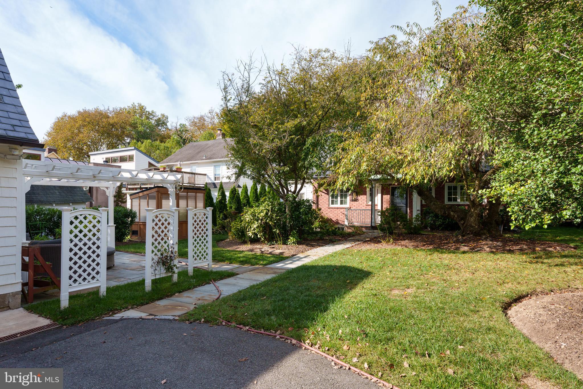 109 Moore Street Princeton, NJ 08540 - Photo 25 of 26 a front view of a house with a yard