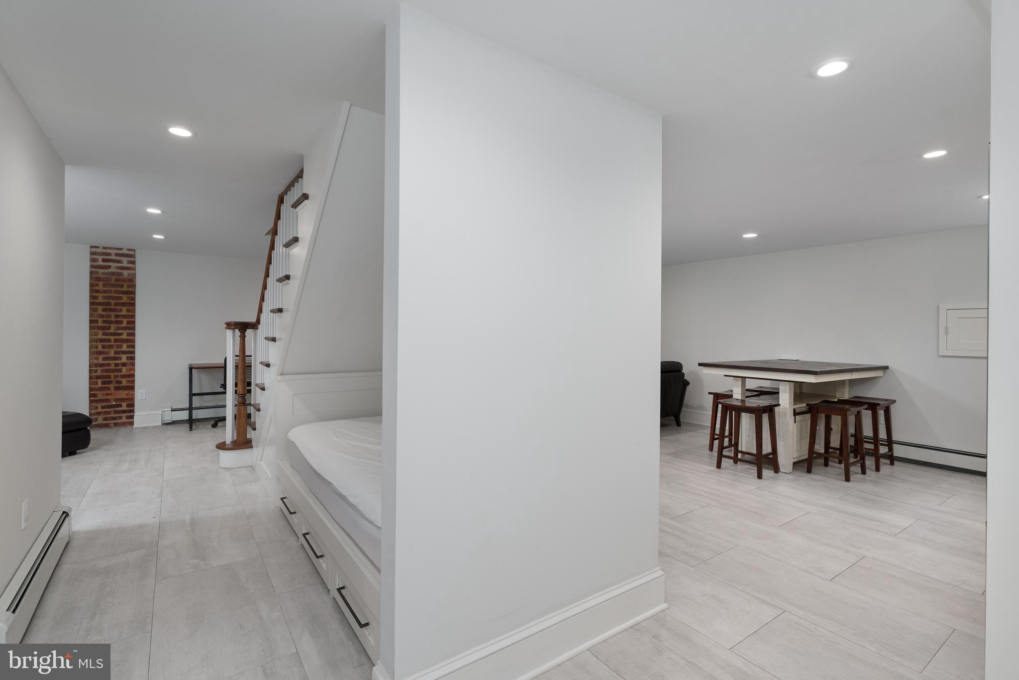109 Moore Street Princeton, NJ 08540 - Photo 4 of 26 an entryway in a hall with a window and furniture