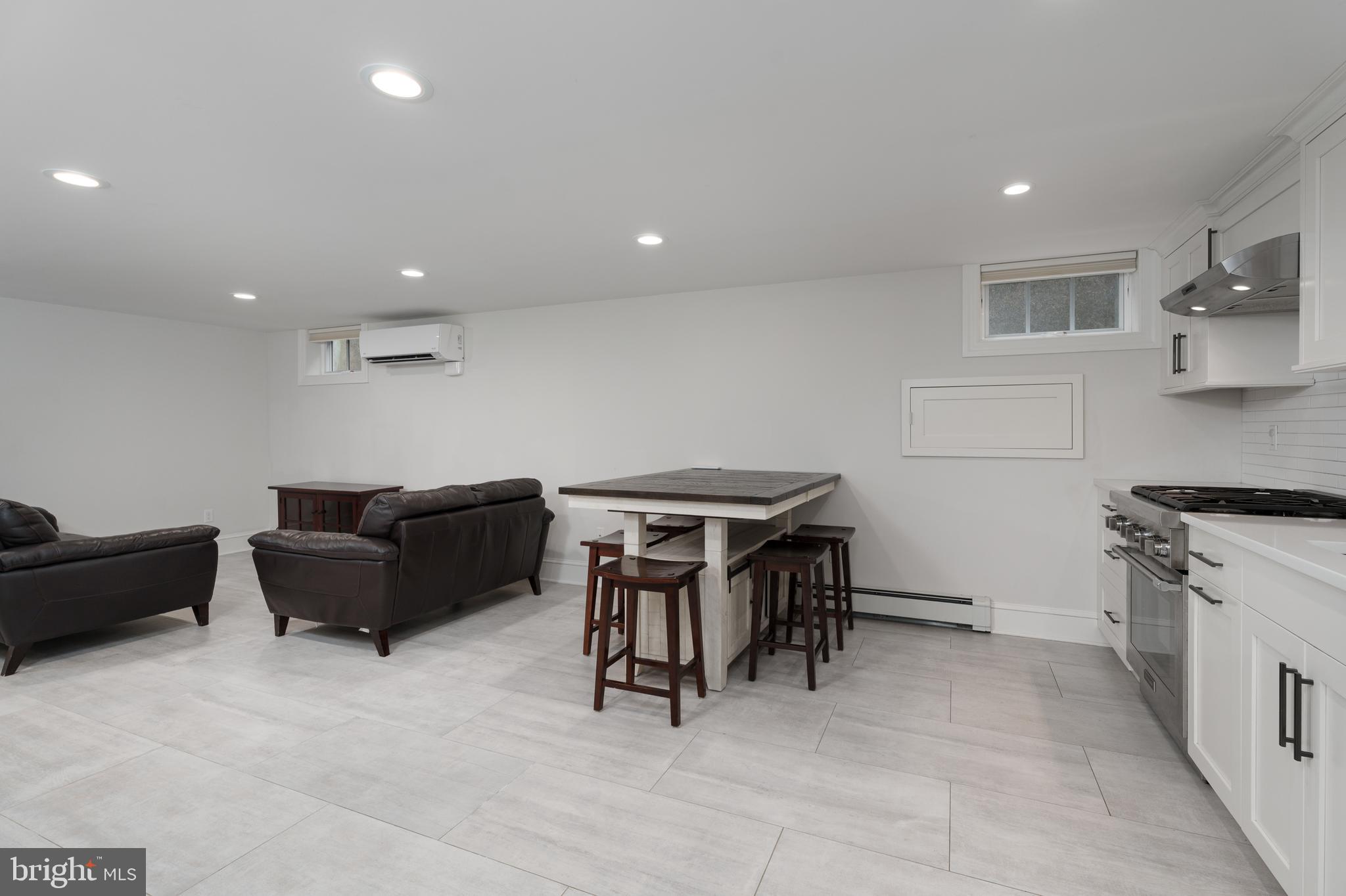 109 Moore Street Princeton, NJ 08540 - Photo 5 of 26 a living room with furniture and a fireplace
