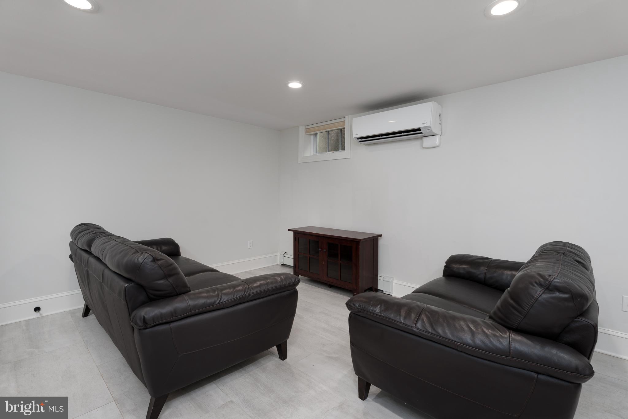 109 Moore Street Princeton, NJ 08540 - Photo 10 of 26 a living room with furniture and a couch