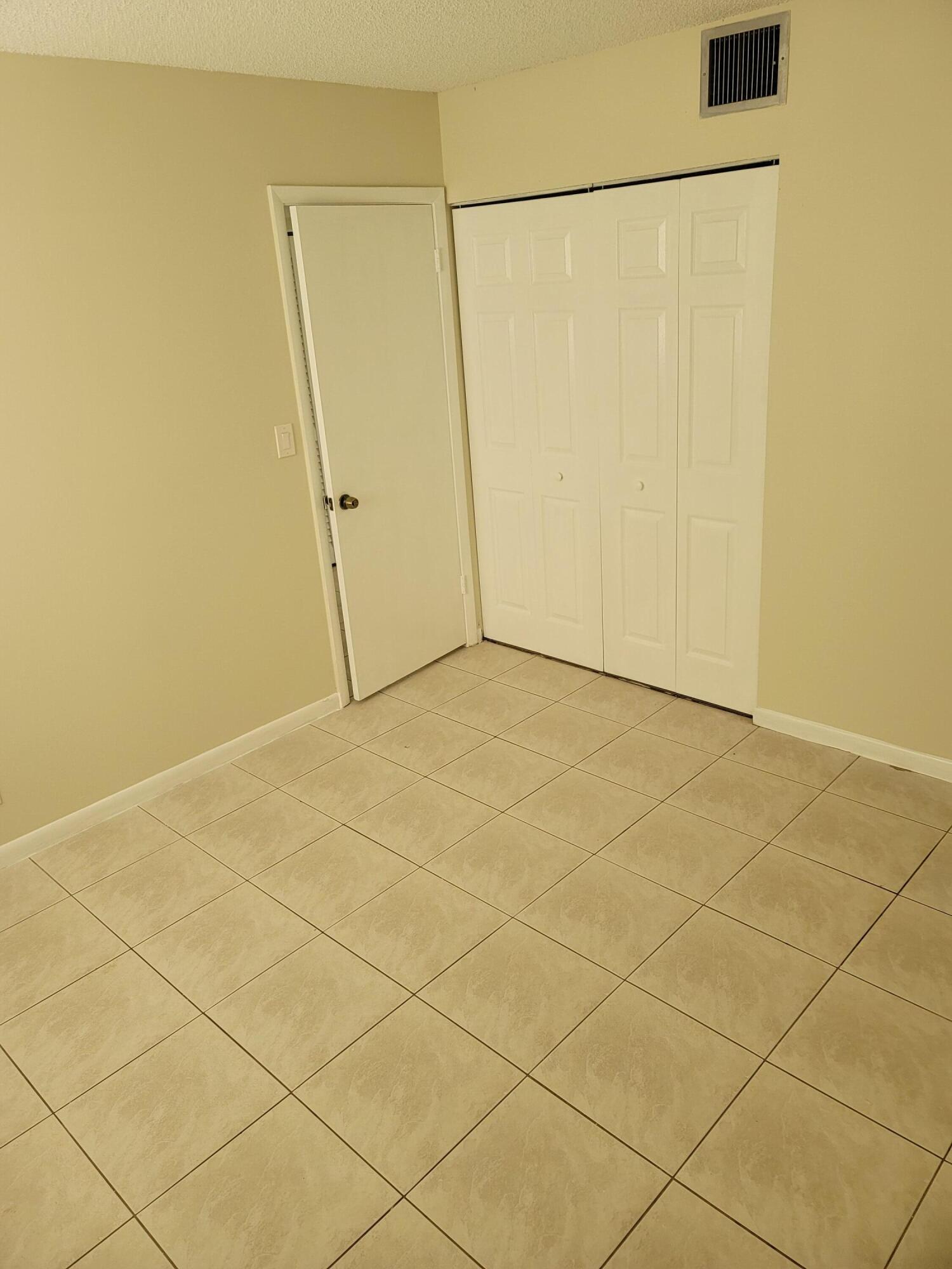 3700-3730 North Pine Island Road, Unit 249 Sunrise, FL 33351 - Photo 11 of 18 a view of an empty room