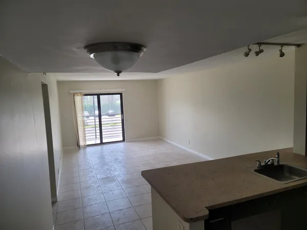 a view of an empty room and window