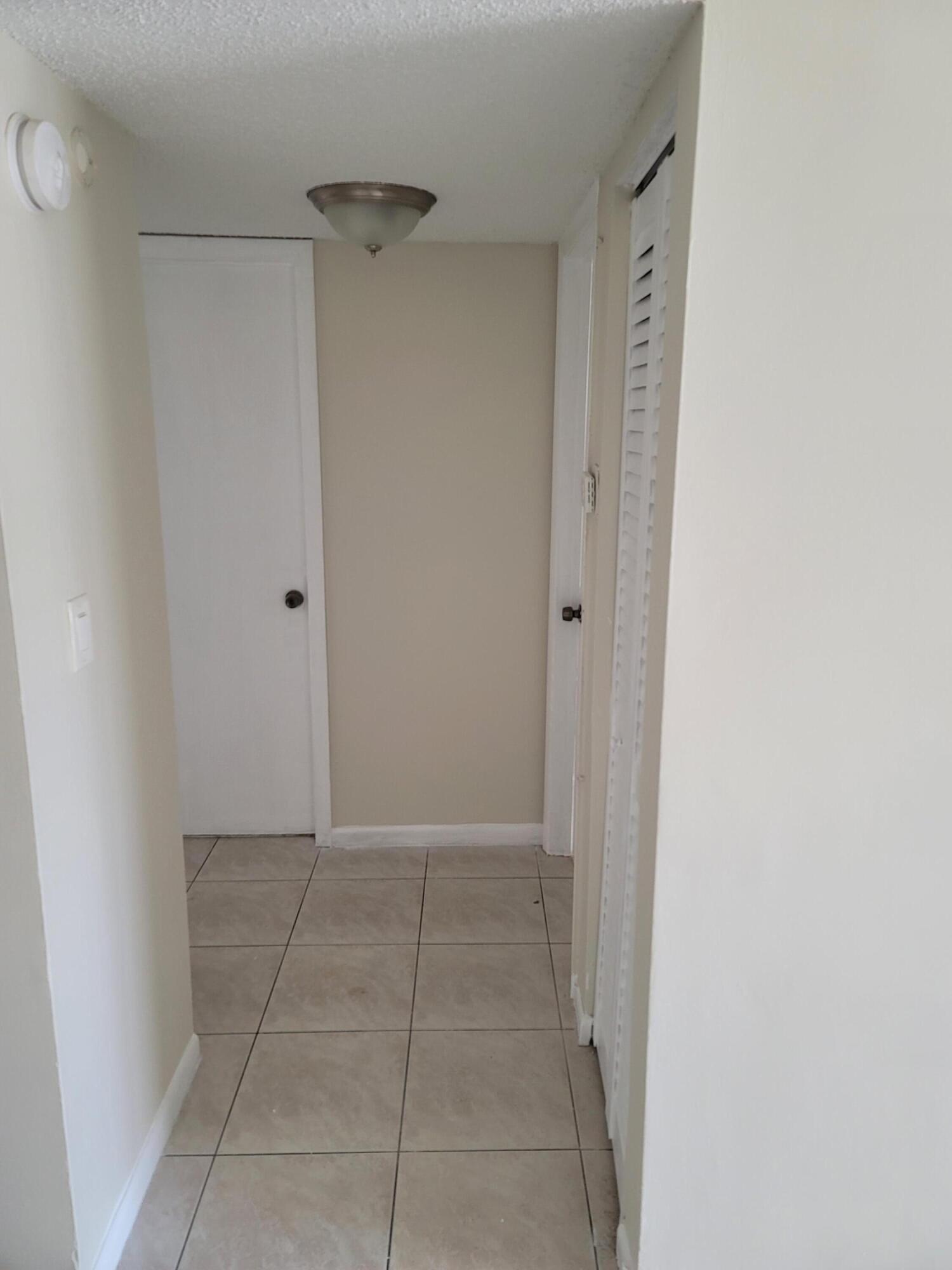 3700-3730 North Pine Island Road, Unit 249 Sunrise, FL 33351 - Photo 9 of 18 a view of an empty room
