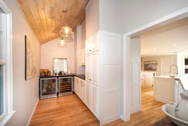 a view of a kitchen from the hallway