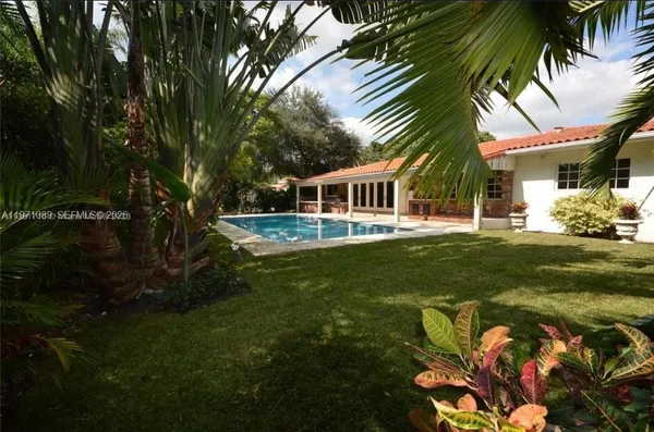 a view of a house with a big yard