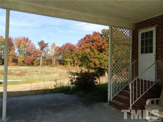 4700 Virgilina Road Roxboro, NC 27574 - Photo 2 of 3 a view of a yard with an outdoor space