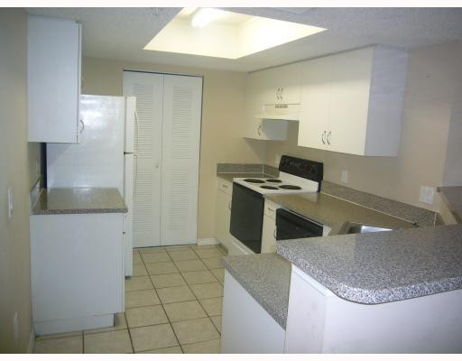 5025 Wiles Road, Unit 306 Coconut Creek, FL 33073 - Photo 3 of 8 Exterior Front