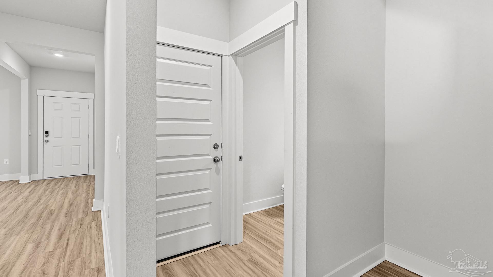 3223 Water Birch Road Cantonment, FL 32533 - Photo 22 of 44 a view of a bedroom with wooden floor