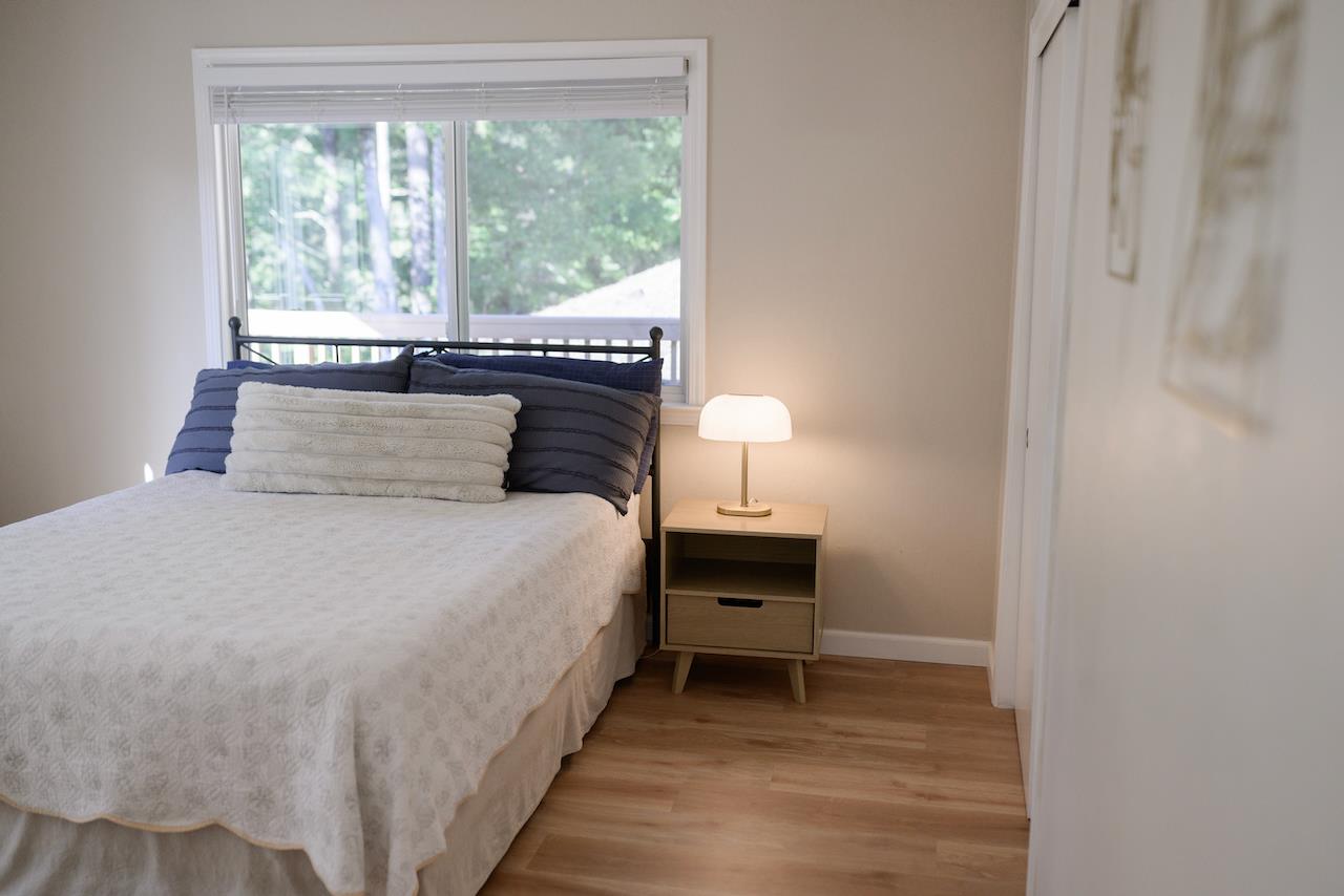 155 Rabbits Run Road Santa Cruz, CA 95060 - Photo 65 of 113 a bedroom with a bed and a window