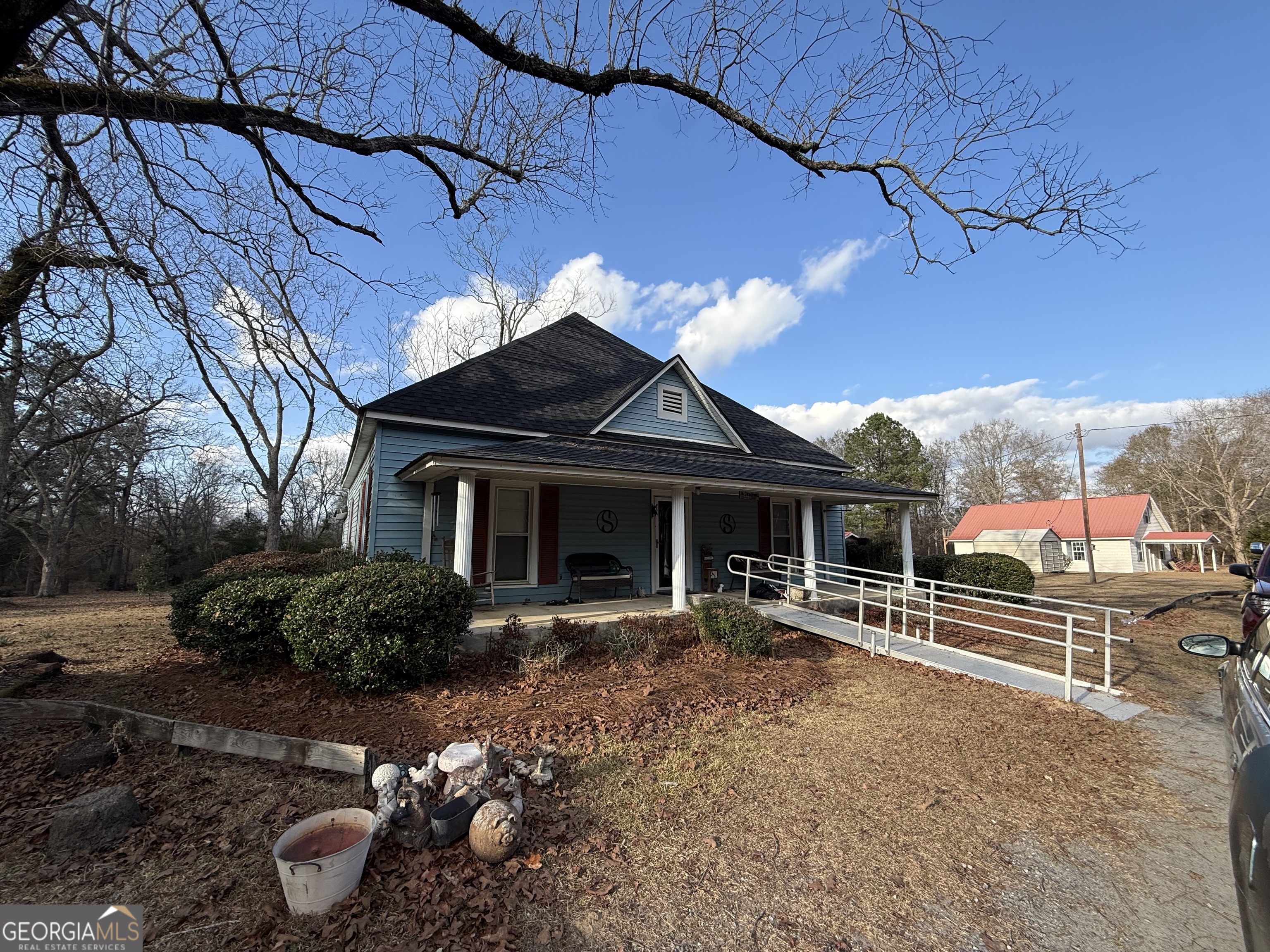 1769 Payne Road Rentz, GA 31075 - Photo 3 of 33 a front view of a house with a yard