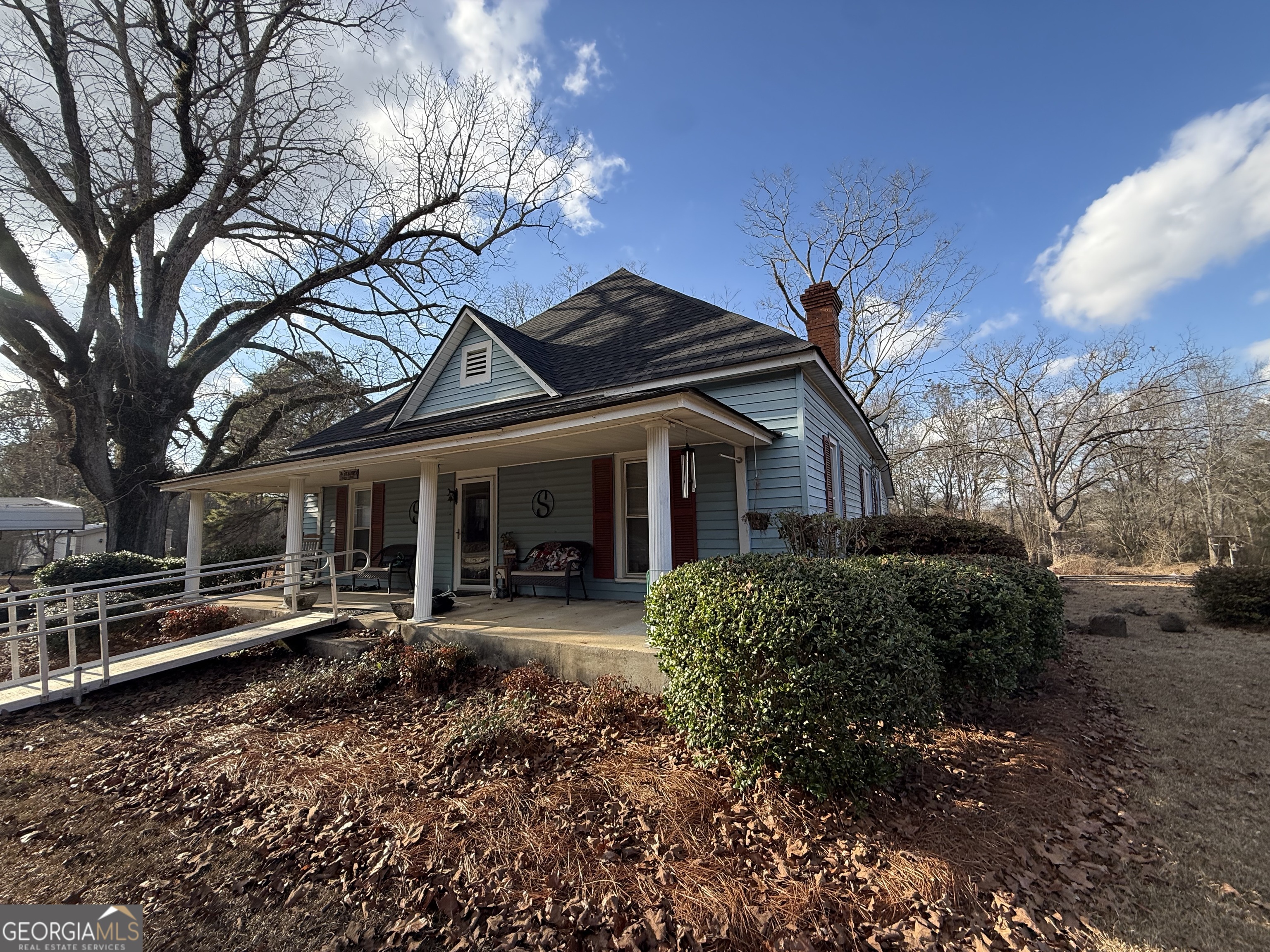 1769 Payne Road Rentz, GA 31075 - Photo 6 of 33 a front view of a house with garden