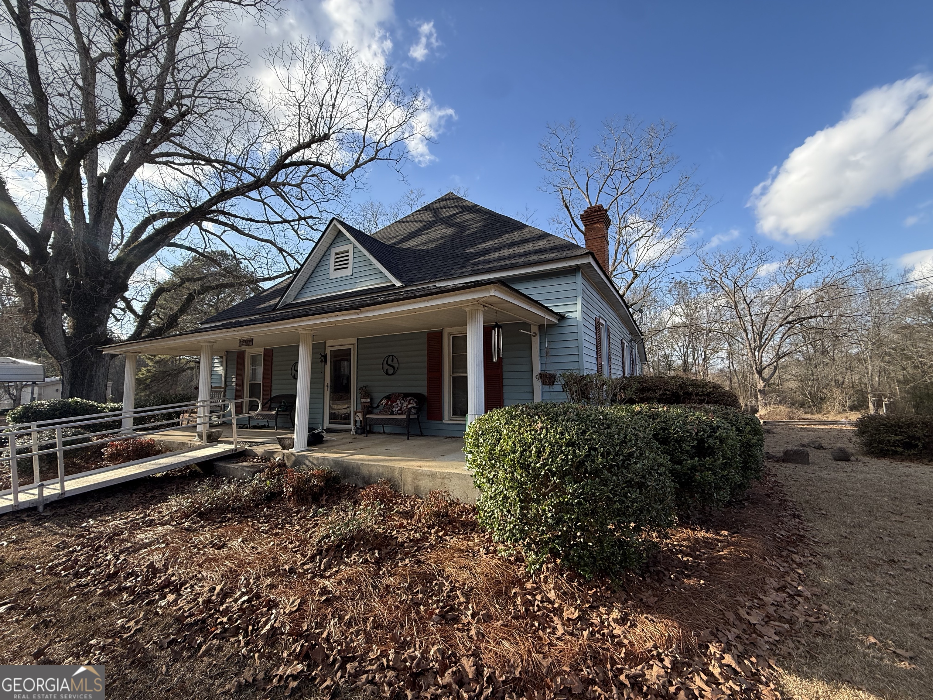 1769 Payne Road Rentz, GA 31075 - Photo 7 of 33 a front view of house with a garden