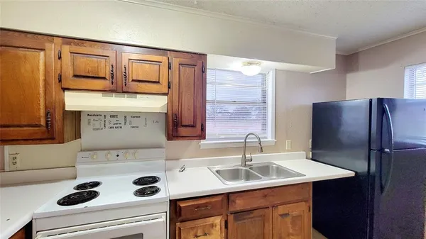 a view of a bathroom from a hallway