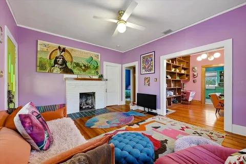 a bedroom with a bed and a fireplace