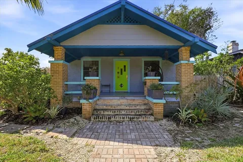 a view of a lounge chair in the backyard of the house