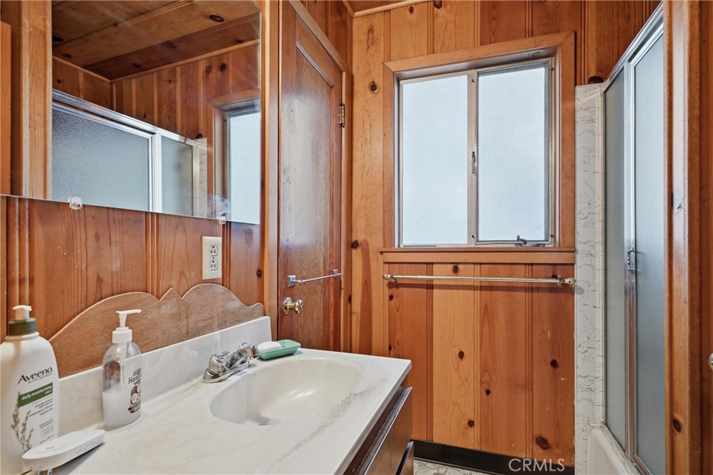 16221 Bottle Rock Road Cobb, CA 95426 - Photo 14 of 21 a bathroom with a sink and a mirror