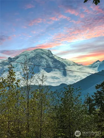 a view of mountain with lake view