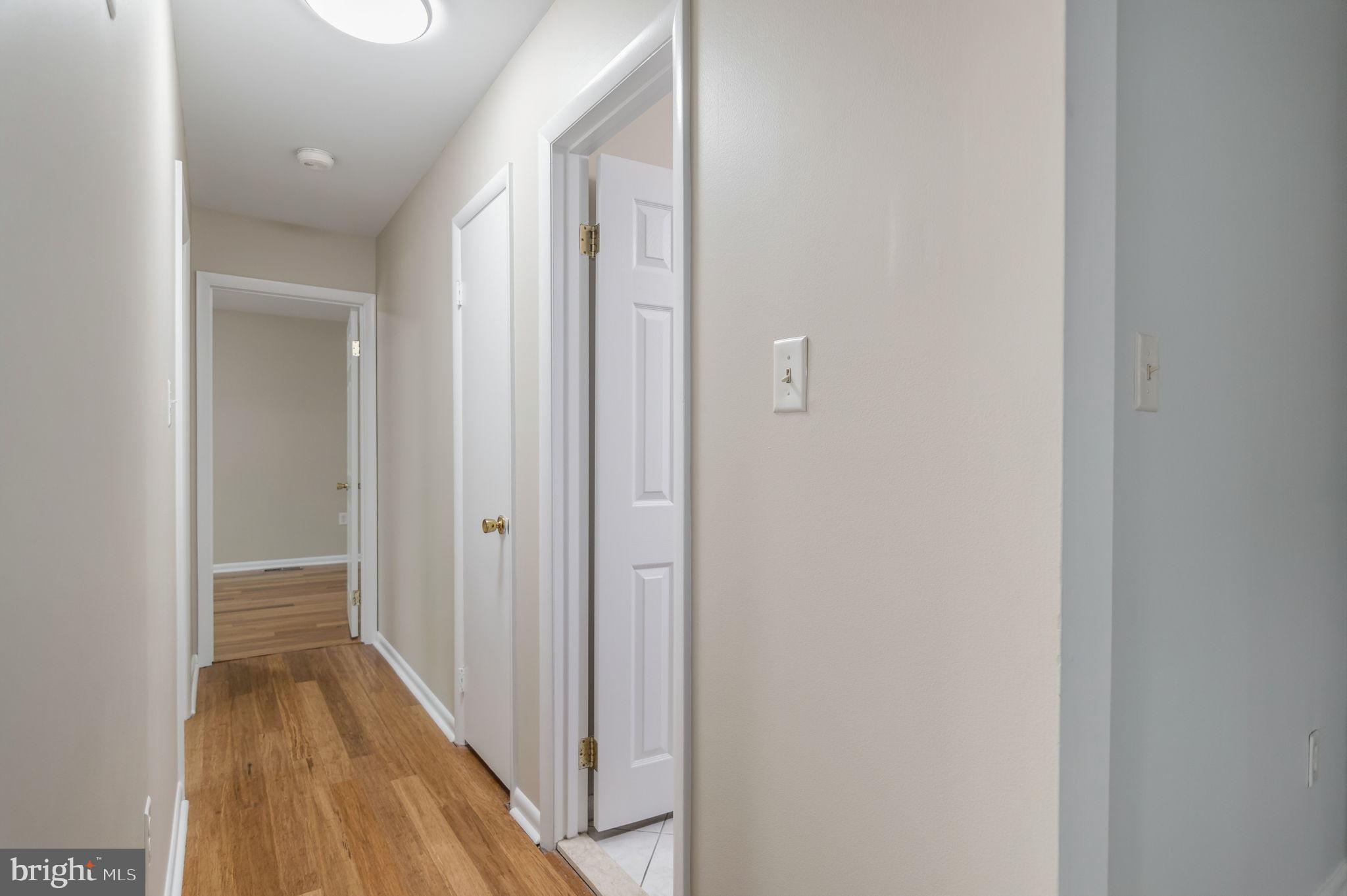 13593 Bethel Road Manassas, VA 20112 - Photo 26 of 54 Hallway off the foyer to the main level bedrooms