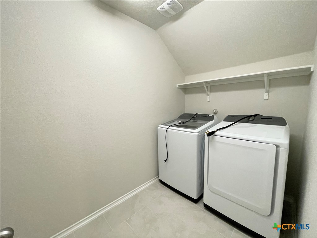 29653 Spring Copper Bulverde, TX 78163 - Photo 20 of 30 a utility room with dryer and washer