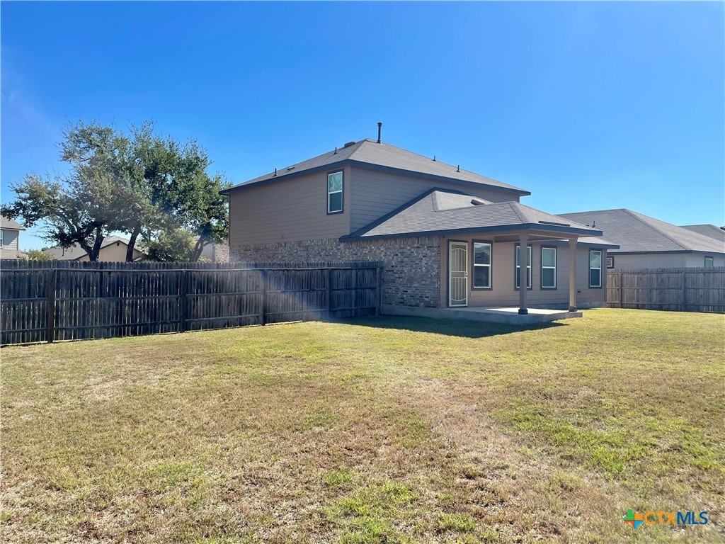 29653 Spring Copper Bulverde, TX 78163 - Photo 21 of 30 a front view of a house with yard and tree