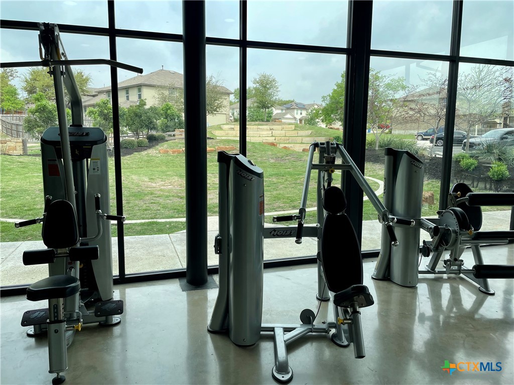 29653 Spring Copper Bulverde, TX 78163 - Photo 28 of 30 a view of a room with gym equipment and floor to ceiling window