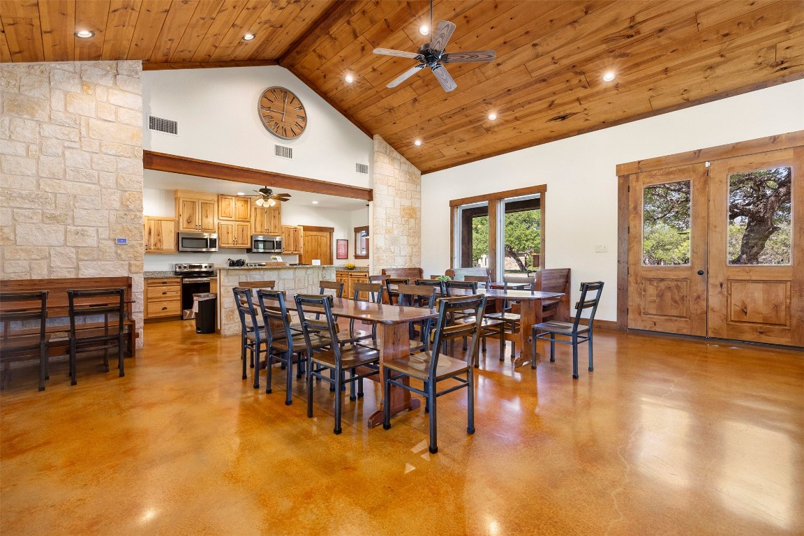 11 Stepping Stone Lane Concan, TX 78838 - Photo 9 of 47 a view of a dining room with furniture window and wooden floor