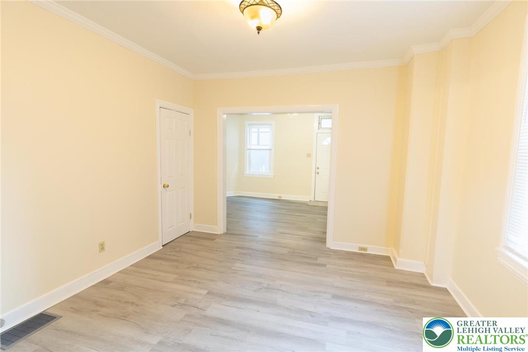 32 West Raspberry Street Bethlehem, PA 18018 - Photo 5 of 17 a view of an empty room with wooden floor
