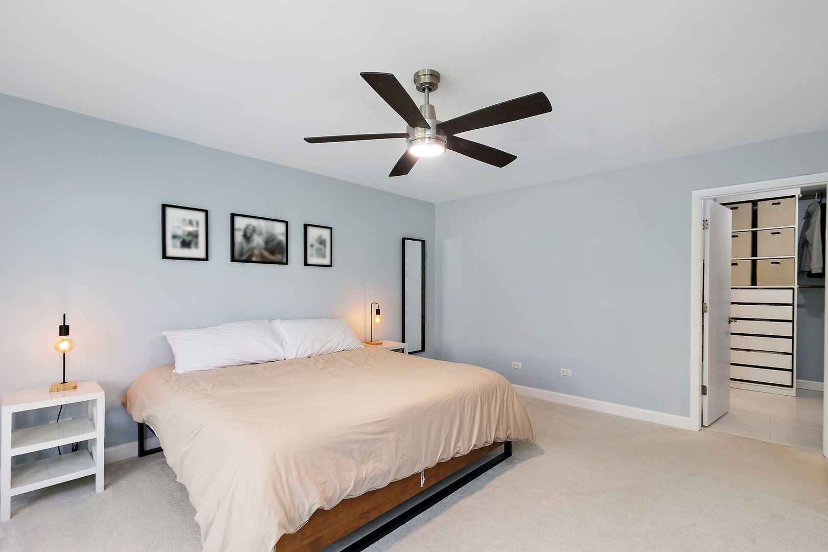 713 Council Hill Road East Dundee, IL 60118 - Photo 16 of 40 a bedroom with a bed and a chandelier