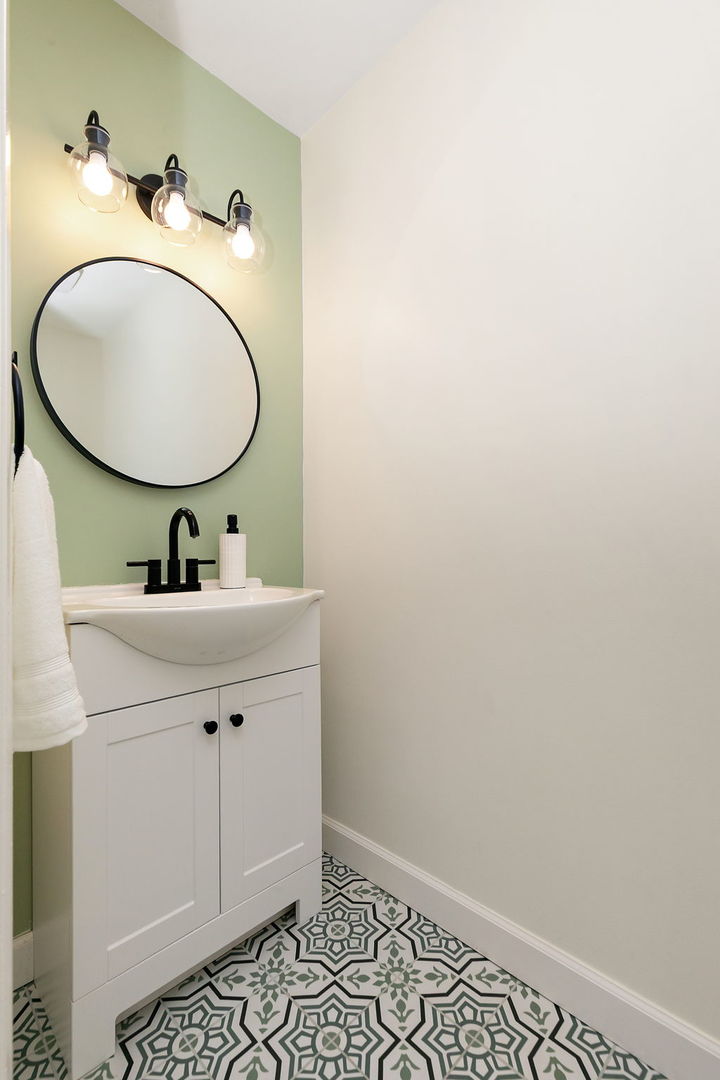 713 Council Hill Road East Dundee, IL 60118 - Photo 24 of 40 a bathroom with a sink mirror and vanity
